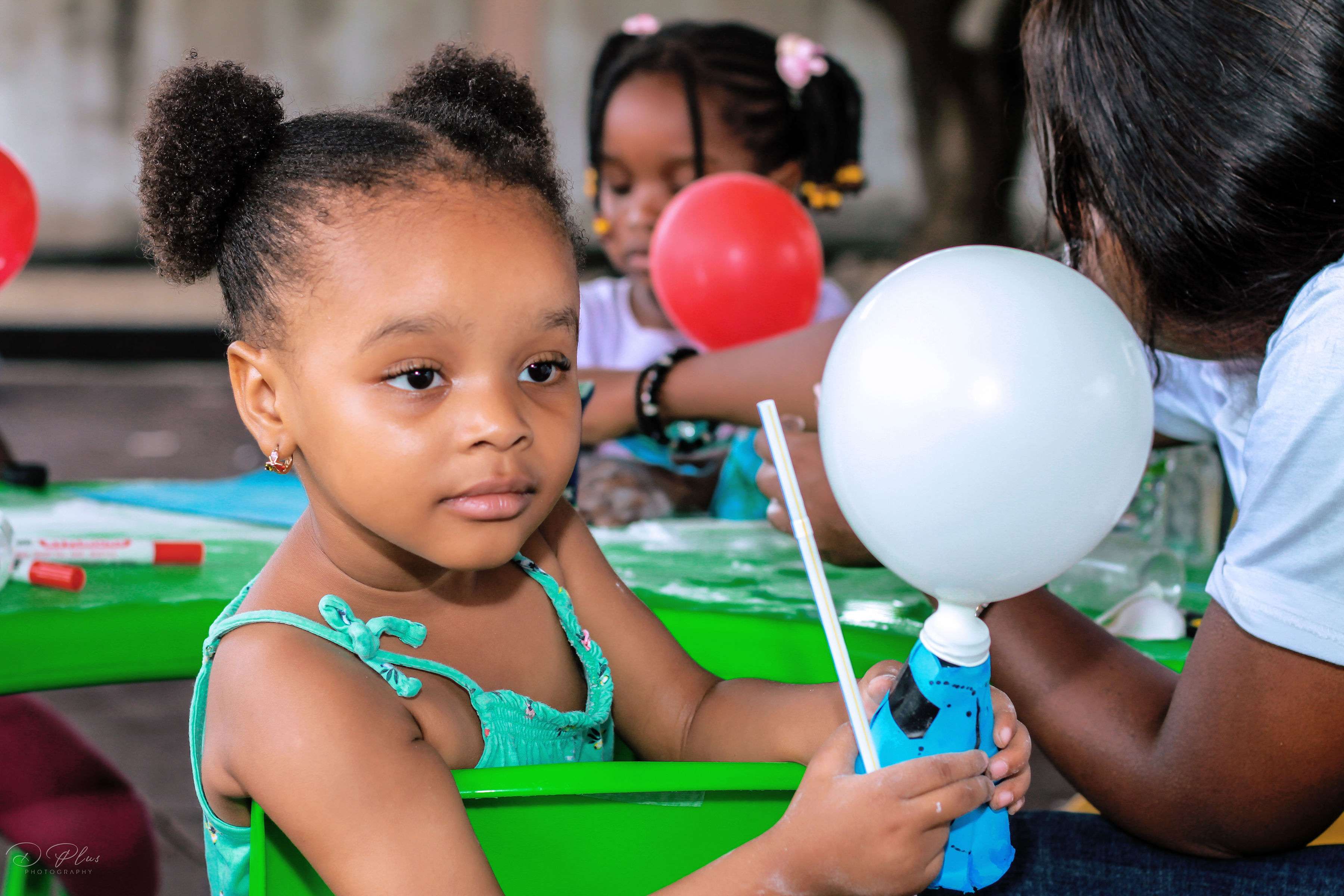 Young learners testing a science project together