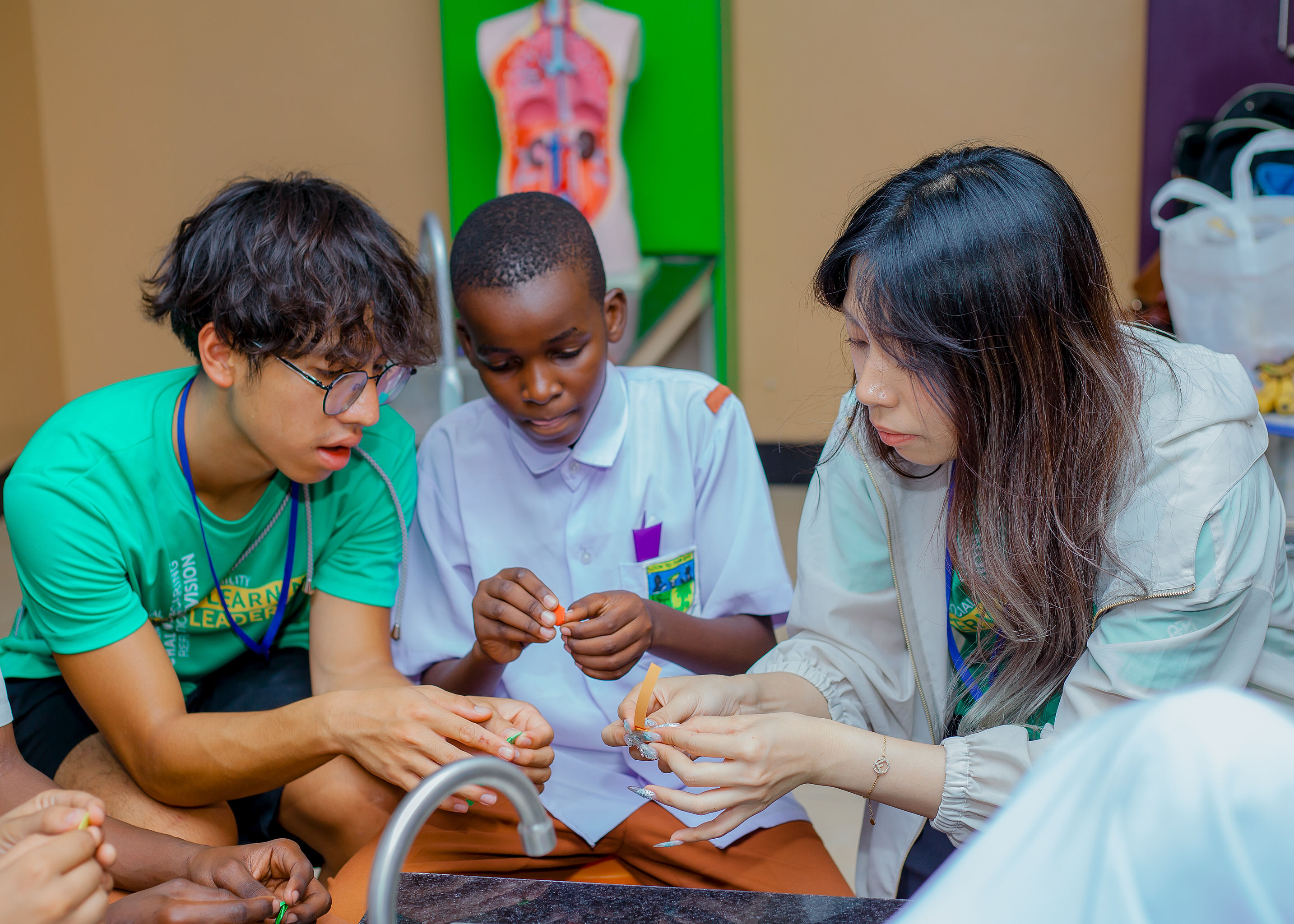 University students exploring artificial intelligence activities at STEM Park Tanga