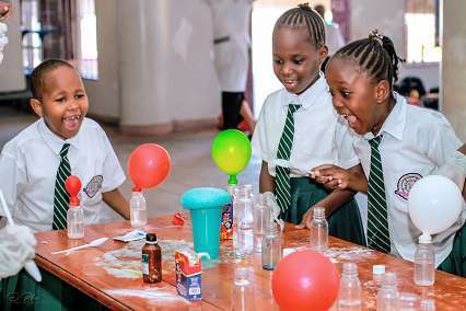 Students taking part in a practical school science session