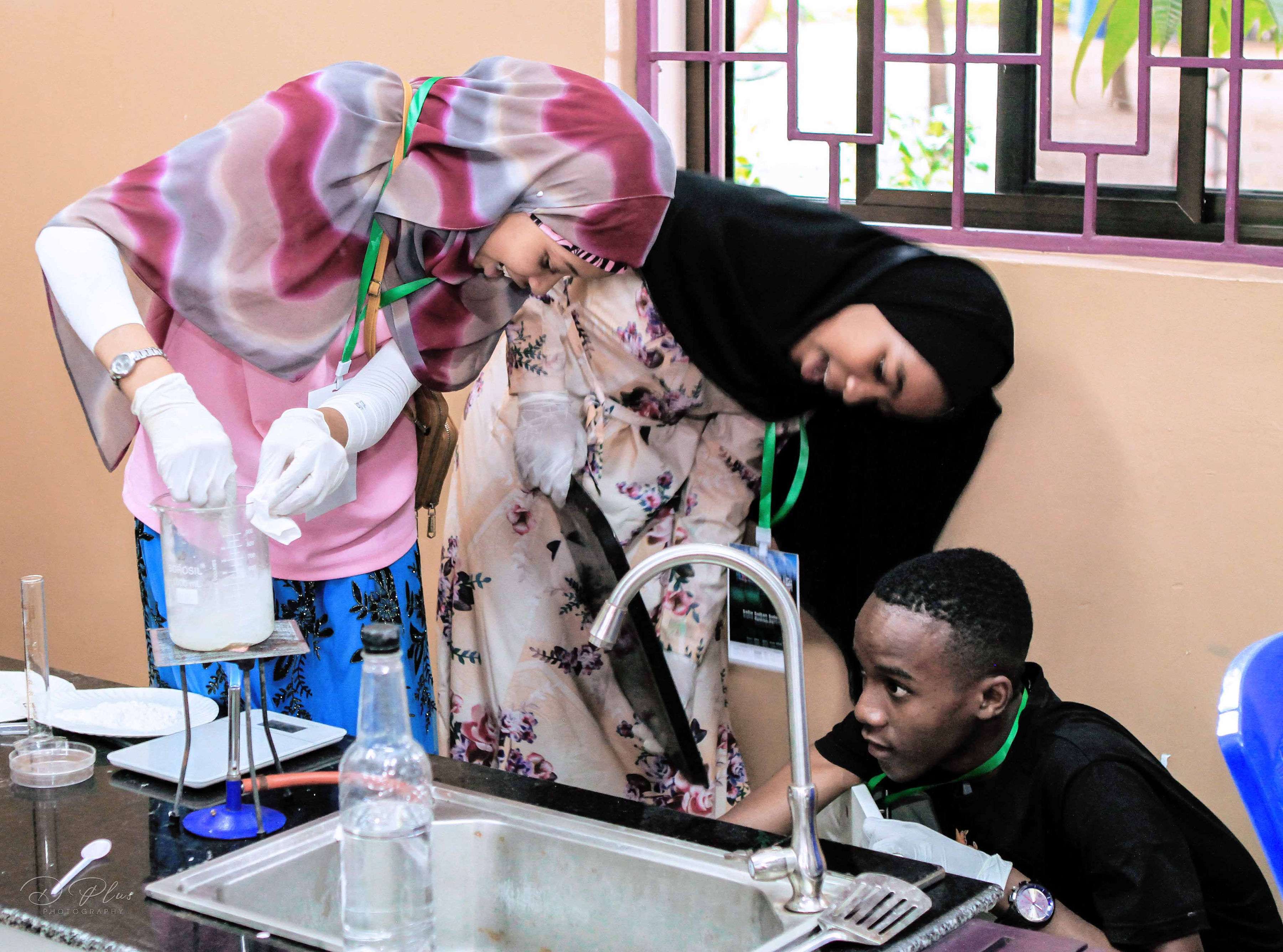 Young innovators demonstrating a project at an annual STEM Youth Boot Camp